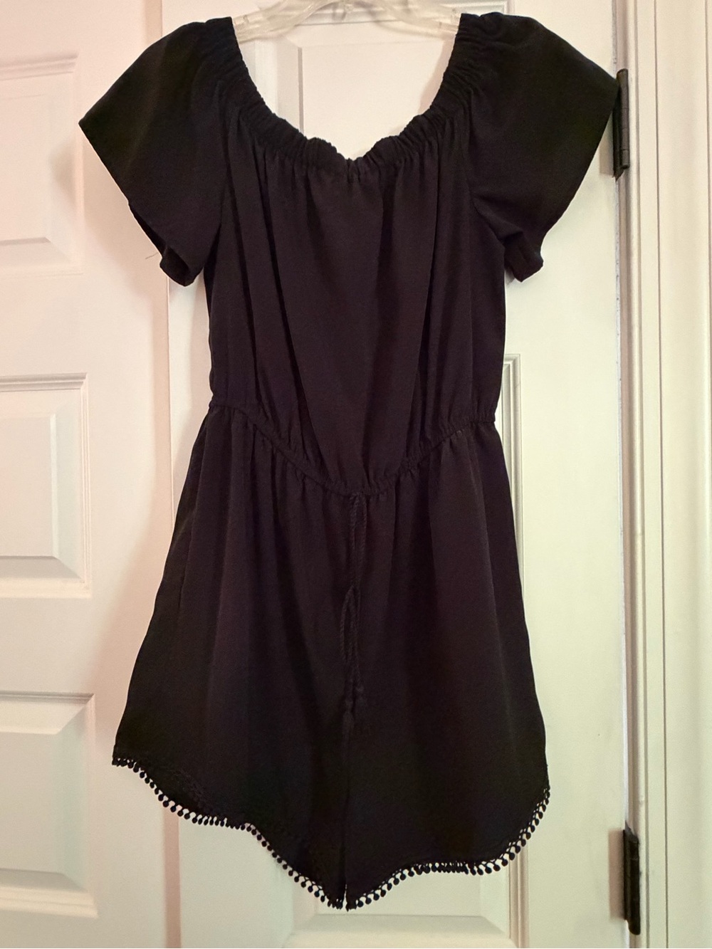 BeBop Black Off-Shoulder Short Sleeve Romper with Pom Hem